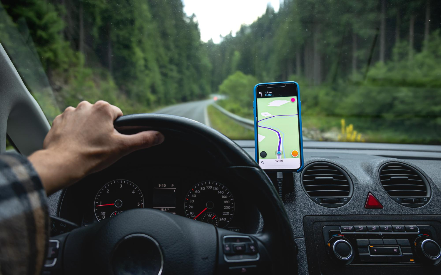 navigator-car-road-forest-area-closeup